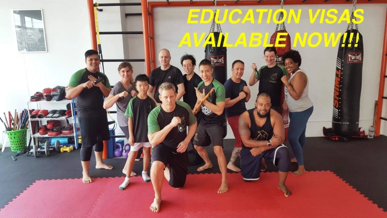 CMLocals Chiang Mai Locals group of martial arts students and instructor representing ED visa education programs